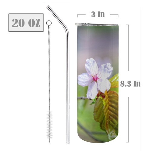 One sakura cherry flowers on a tree in spring. 20oz Tall Skinny Tumbler with Lid and Straw