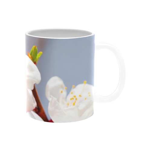 Magnificent Japanese apricot flowers on a tree. White Mug(11OZ)