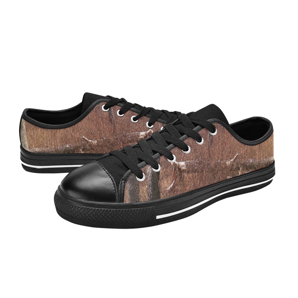 Falling tree in the woods Women's Classic Canvas Shoes (Model 018)