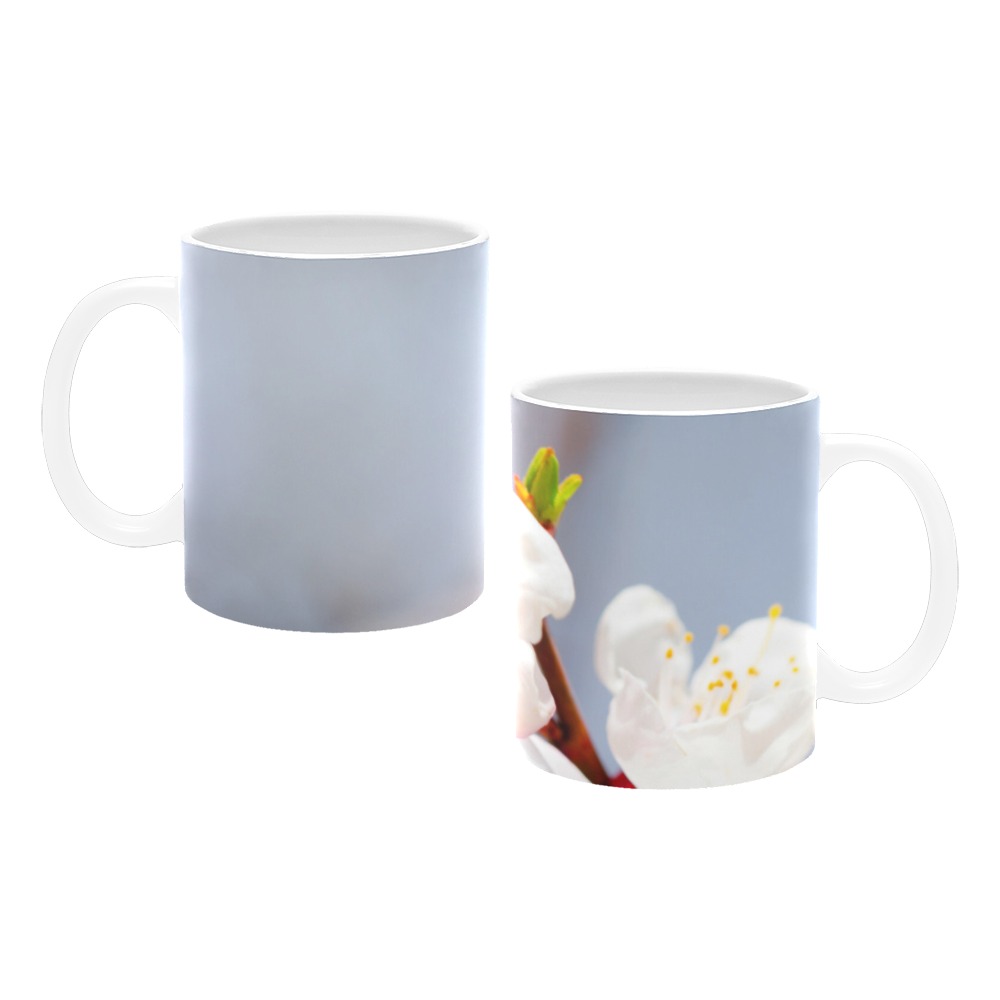 Magnificent Japanese apricot flowers on a tree. White Mug(11OZ)