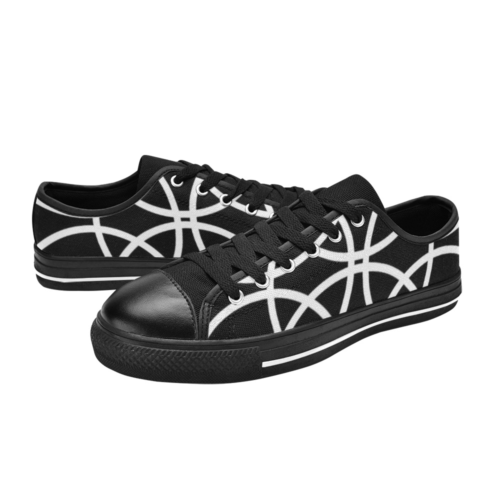 White Spiral Circles on black background Women's Classic Canvas Shoes (Model 018)