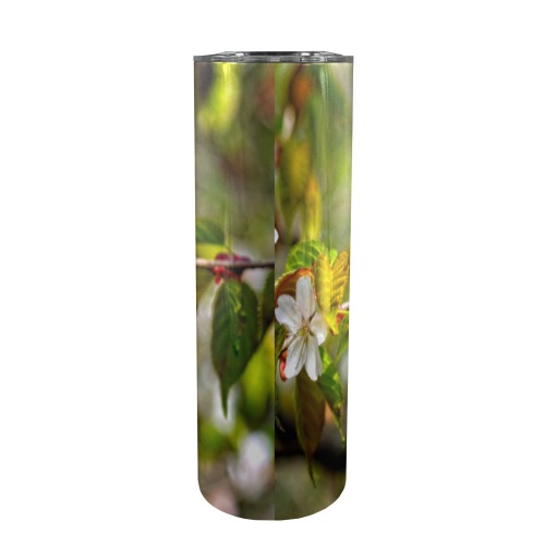 Small bee on a sakura flowers on a sunny day. 20oz Tall Skinny Tumbler with Lid and Straw